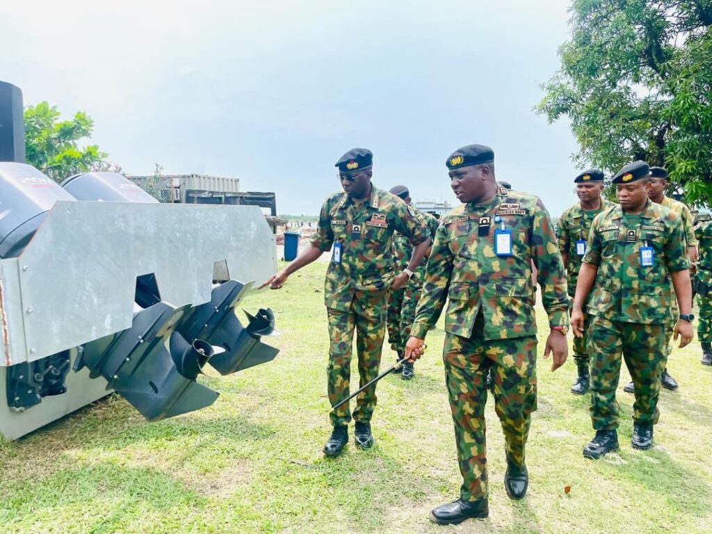 visit of R Adm SJ Bura, Flag Officer Commanding Central Naval Command to  inspect houseboat nestled in the jetty and the newly constructed 10 x 8.5M semi-ballistic flat bottom assault boats.
